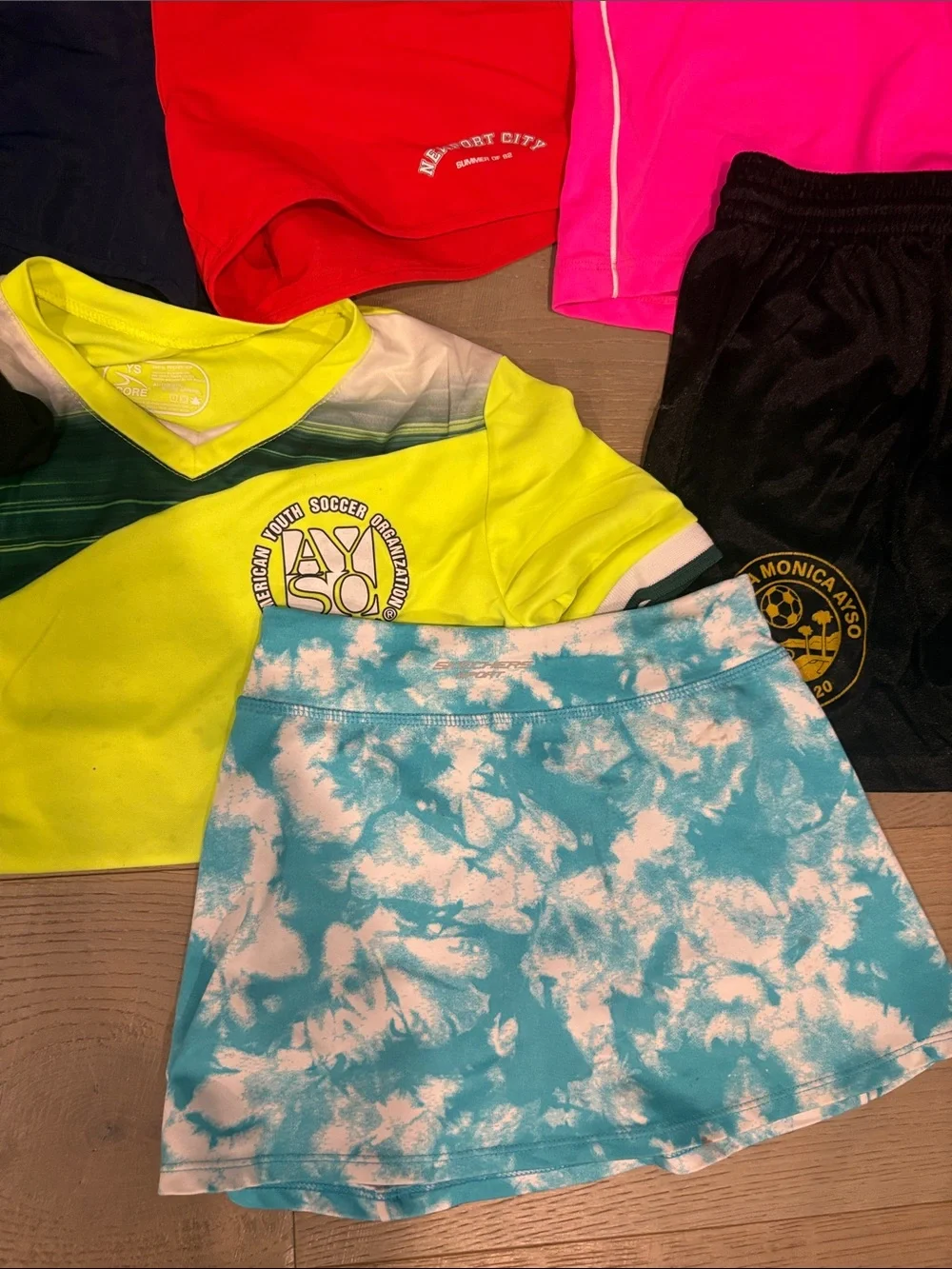 Lot of girls soccer and work out separates